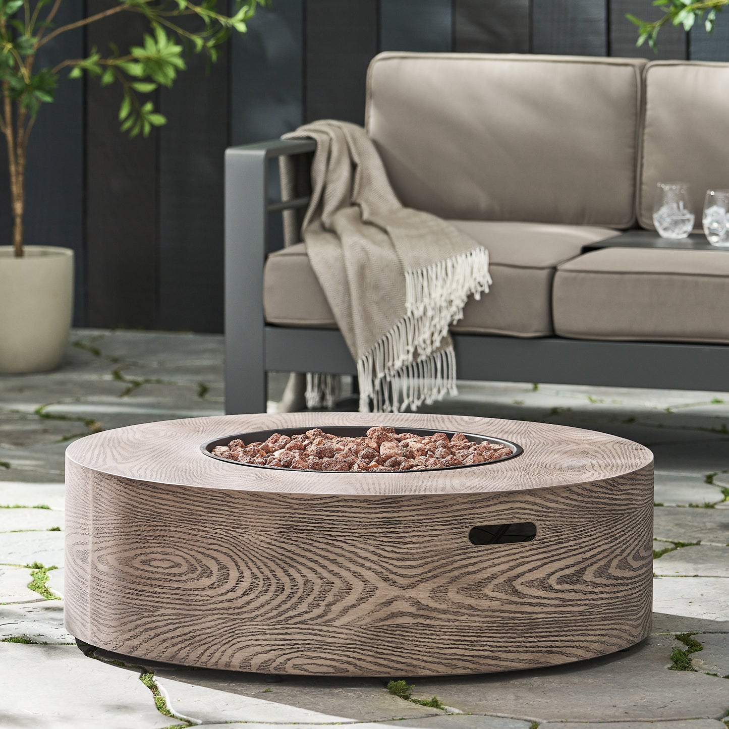 AIDAN ROUND IRON FIRE PIT - 50,000 BTU TANK OUTSIDE